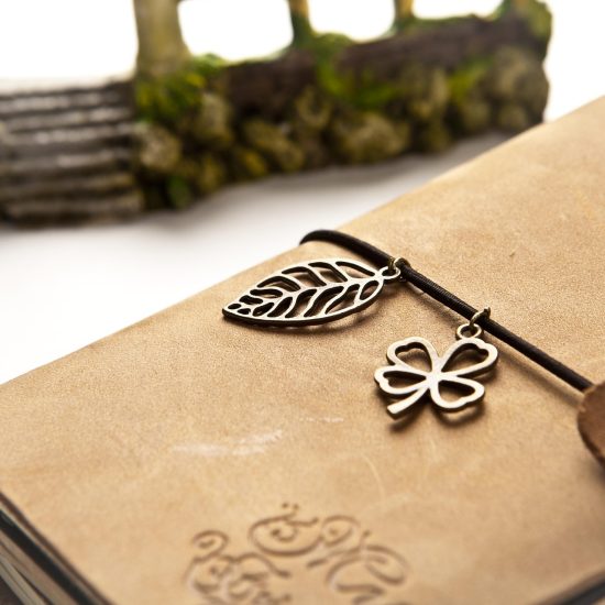 Leather journal with charms