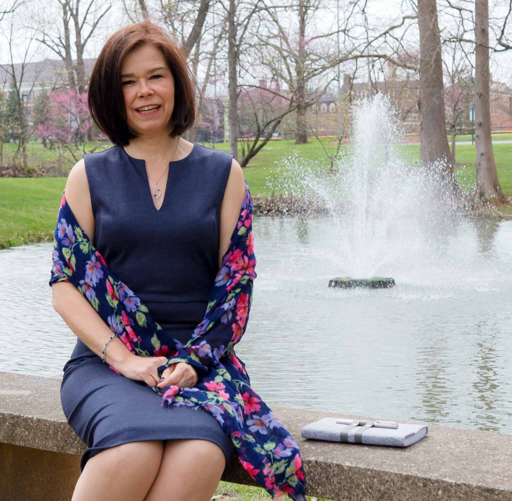 About - Acting Your Way ChristineHannon-52-sitting beside fountain